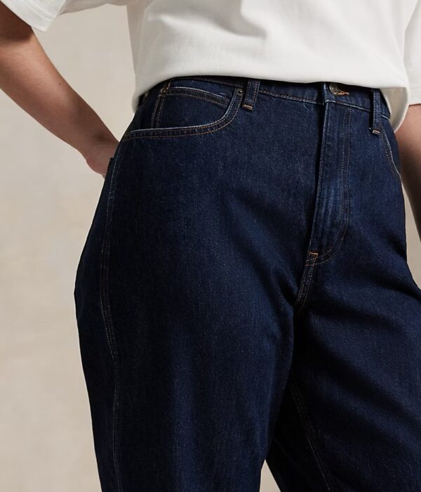 Страничен изглед на дамски тъмносини дънки със свободен силует и висока талия Next Level