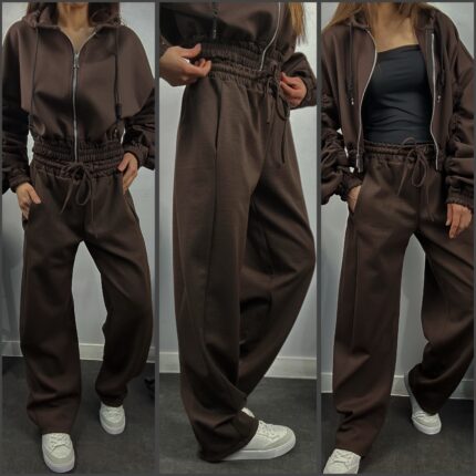 Страничен изглед на кафяв ватиран дамски спортен комплект Next Level